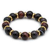 Close-up of women's Garnet Almandine, Agate Eye, and Red Tiger Eye bracelet.